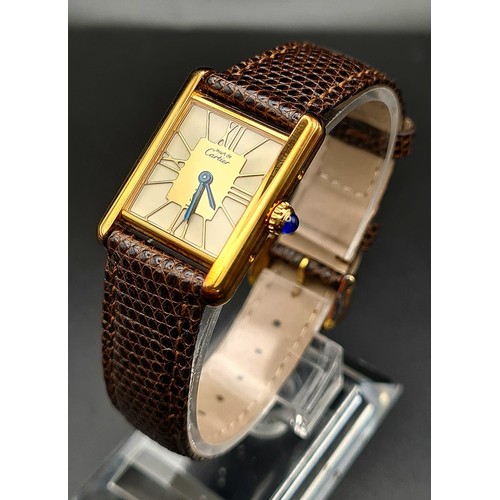 727 - A Must de Cartier Ladies Tank Watch. Alligator strap. 925 gilded case - 27 x 20mm. Quartz movement.