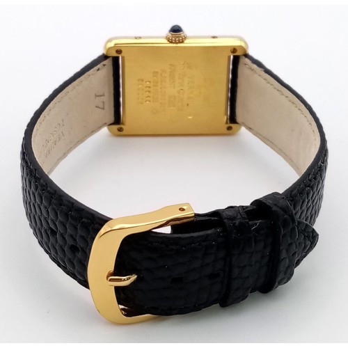 204 - A Must de Cartier Ladies Tank Watch. Black leather strap. 925 silver gilt case - 30 x 23mm. Quartz m... 