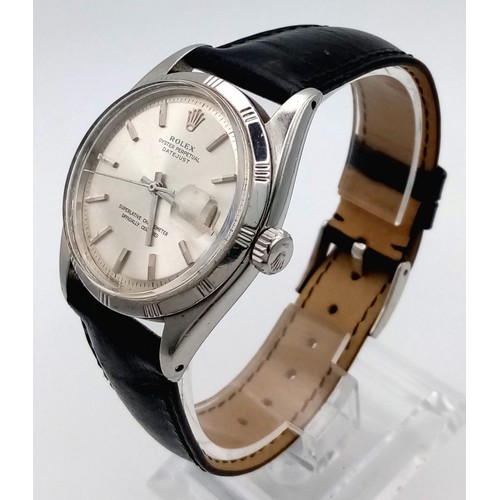 691 - A Rolex Oyster Perpetual Datejust Gents Watch. Black leather strap. Stainless steel case - 35mm. Sil... 