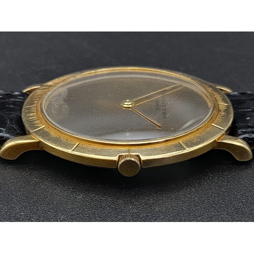 378 - A Vacheron Constantin 18K Gold Cased Ladies Watch. Black leather strap. Gold case - 30mm. Gold tone ... 