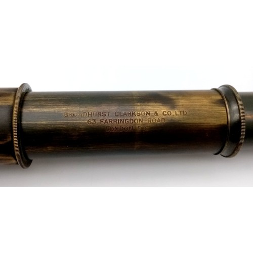 1004 - An Antique Three Draw Brass Telescope. Leather bound.
87cm fully extended. Good condition but a/f.