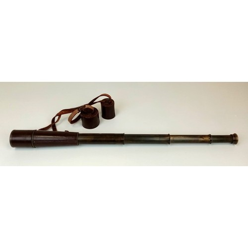 1004 - An Antique Three Draw Brass Telescope. Leather bound.
87cm fully extended. Good condition but a/f.