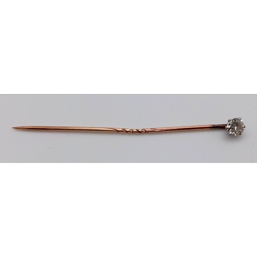 734 - A Victorian Diamond Stick Pin. A Glorious brilliant round cut diamond on yellow metal - 0.25ct. Come... 