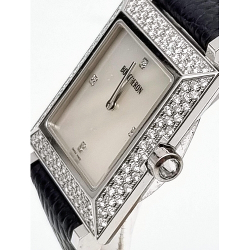 81 - A Boucheron 18K Gold and Diamond Ladies Watch. Black leather strap. Gold and diamond rectangular cas... 