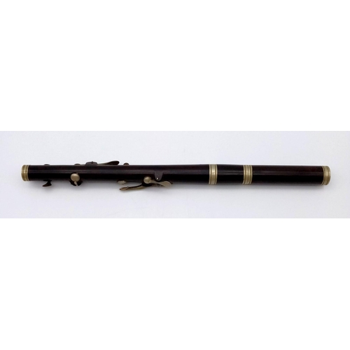 989 - A Pair of Late 19th Century Six-Key Flutes. One made by J. Wallis and Sons of London - has a small s... 