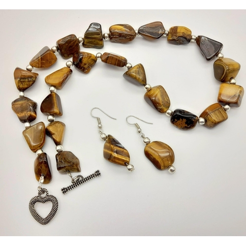 154 - A totally natural, TIGER’S EYE necklace and earrings set with large cabochons. Necklace length: 52 c... 