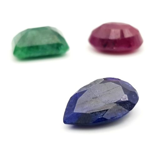 329 - Lot of 3 Gemstones - 12.70 Ct Mixed Cut Ruby, 9.40 Ct Mixed Cut Emerald, 6.75 Ct Mixed Cut Blue Sapp... 