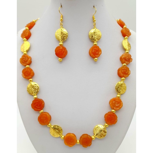 218 - A very unusual, hand carved, rose forming, carnelian beads and yellow gold gilded necklace and earri... 