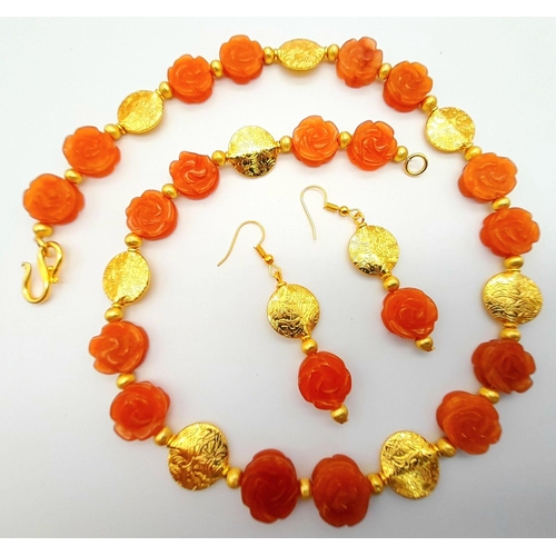 218 - A very unusual, hand carved, rose forming, carnelian beads and yellow gold gilded necklace and earri... 