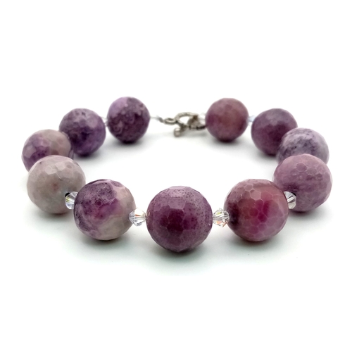 317 - A Vintage Retro Faceted Natural Amethyst Bead Bracelet. Crystal spacers. 20cm. 12mm beads.