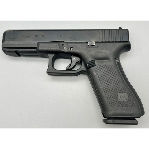 113 - A Deactivated 9mm Glock Model 17 Generation 5 Semi-Automatic Pistol. Comes with extra grip sets and ... 