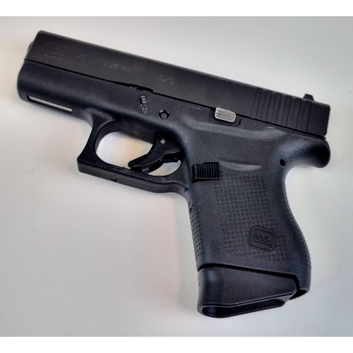 193 - A Deactivated 9mm Model G43 Slimline Semi-Automatic Glock Pistol. Comes with spare magazine and load... 