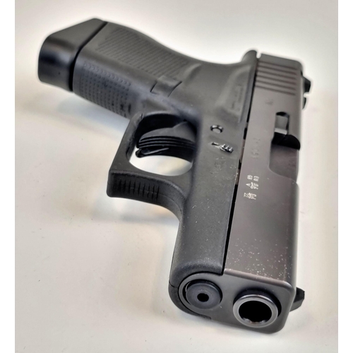 193 - A Deactivated 9mm Model G43 Slimline Semi-Automatic Glock Pistol. Comes with spare magazine and load... 