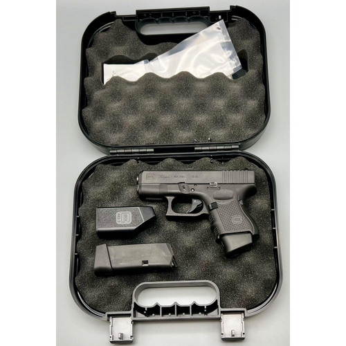 242 - A Deactivated 9mm Glock Model 26 Generation 4 Semi-Automatic Pistol. Comes with two extended magazin... 