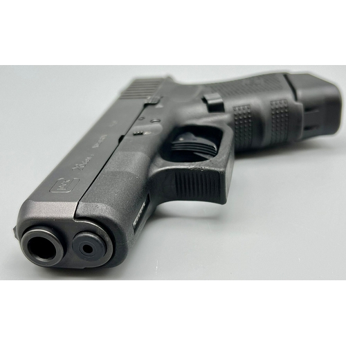 242 - A Deactivated 9mm Glock Model 26 Generation 4 Semi-Automatic Pistol. Comes with two extended magazin... 