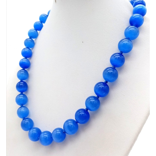 391 - A Blue Opalite Cat's Eye Bead Necklace. 12mm beads. 42cm