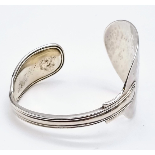 58 - An Antique Silver Spoon Converted into a Bangle! Hallmarks for London 1850. 56.3g.