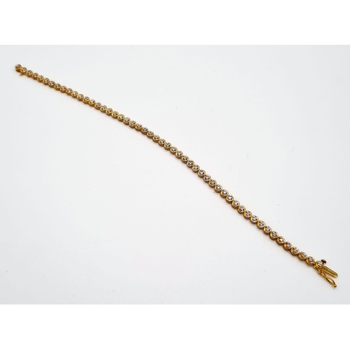 60 - A Compton and Woodhouse 9K Yellow Gold Diamond Tennis Bracelet. 0.5ct diamond weight. 5.74g total we... 