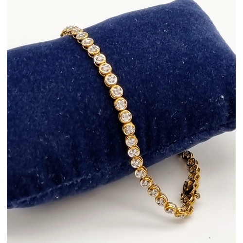 60 - A Compton and Woodhouse 9K Yellow Gold Diamond Tennis Bracelet. 0.5ct diamond weight. 5.74g total we... 