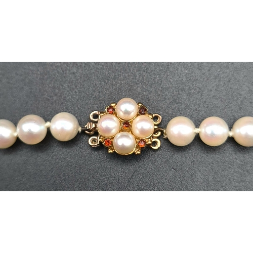 397 - A SINGLE ROW OF CULTURED PEARLS WITH 9K GOLD CLASP    68cms IN LENGTH