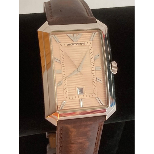 28 - Gentlemans ARMANI quartz wristwatch with the ARMANI Signature design large square lined face with se... 