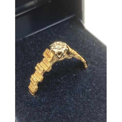 56 - 18 carat GOLD RING Having intricate goldwork shoulders with illusion set DIAMOND mounted to top.
2.8... 