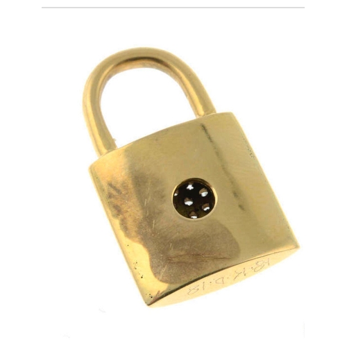 428 - A 18ct gold padlock pendant, with pavé-set diamond heart.

Total diamond weight 0.18ct, marked to mo... 