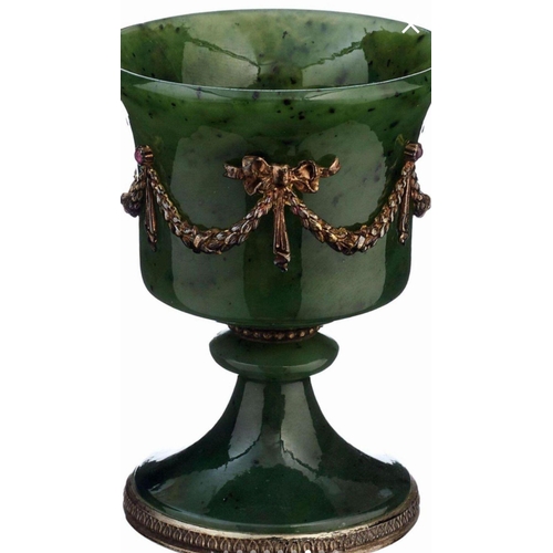 54 - A Faberge nephrite jade cup, 20th century, the bell shape bowl with applied silver swags tied with r... 