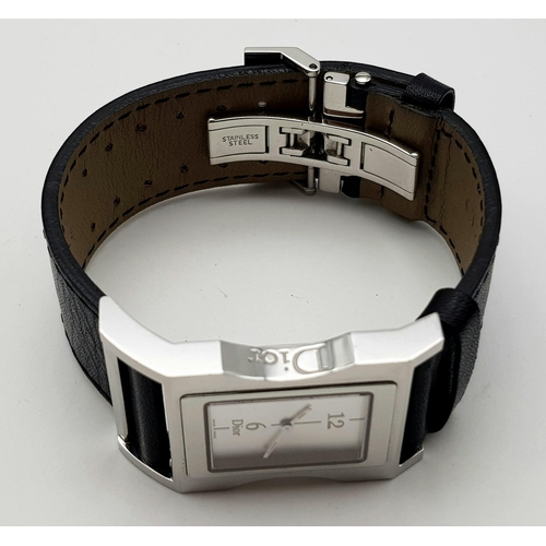 10 - A Stylish Cristian Dior Ladies Watch. Black leather strap with stainless steel case - 30mm width. Qu... 