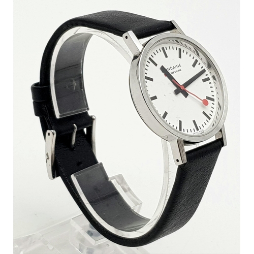 17 - A Vintage Mondaine Railway Watch. Black leather strap. Stainless steel case - 32mm. Quartz movement.... 