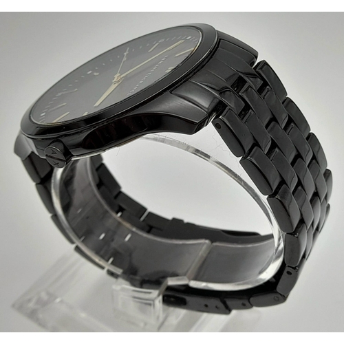 382 - An Armani Exchange Gents Large-Cased Gents Watch. Black metal strap and case - 45mm. Black dial. Qua... 