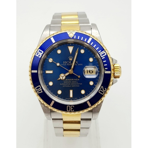 15 - A ROLEX SUB-MARINER IN BI-METAL WITH BLUE BEZEL AND FACE AND IN GOOD ORDER THROUGHOUT. 40mm