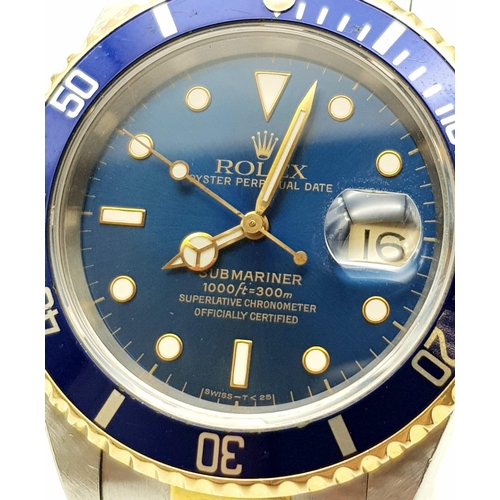 15 - A ROLEX SUB-MARINER IN BI-METAL WITH BLUE BEZEL AND FACE AND IN GOOD ORDER THROUGHOUT. 40mm