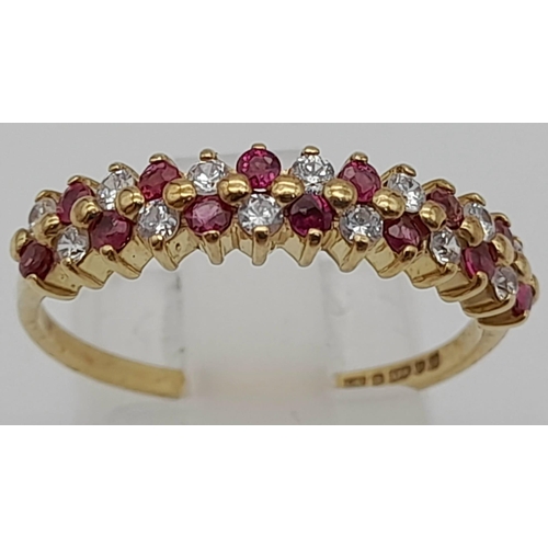 226 - A 9 K yellow gold ring with rubies and diamonds. Size: Q, weight: 2 g.