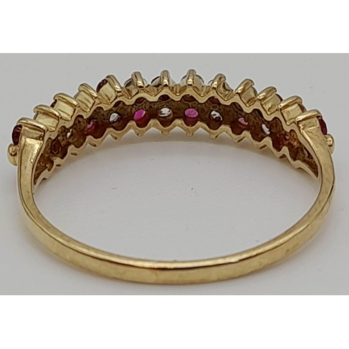 226 - A 9 K yellow gold ring with rubies and diamonds. Size: Q, weight: 2 g.