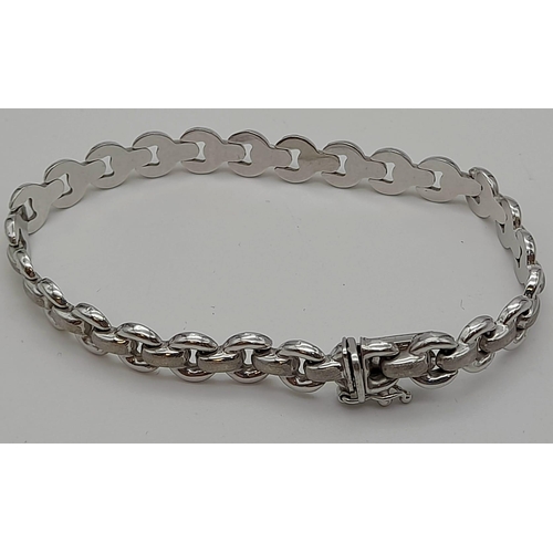 339 - A 9 K white gold fancy link bracelet. Weight: 8.2 g.