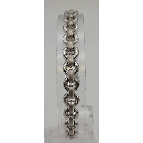 339 - A 9 K white gold fancy link bracelet. Weight: 8.2 g.