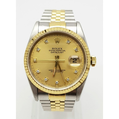 340 - A ROLEX OYSTER PERPETUAL DATEJUST IN BI-METAL WITH DIAMOND NUMERALD AND GOLDTONE FACE. 36mm
comes wi... 