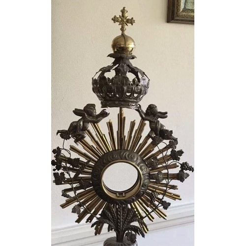 607 - Antique Continental Solid Silver Monstrances With Cross on Crown & Cherubs.
Size

Height. :::: 63.3 ... 