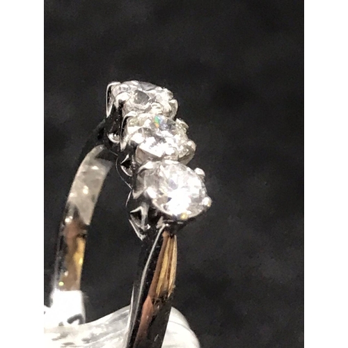 61 - 18ct gold three diamonds ring of one carat diamonds in total and hallmarked for Sheffield with maker... 