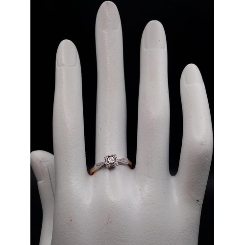 2 - An Illusion set 0.33 carat diamond ring set with diamond shoulders. This is set in 18ct yellow gold ... 