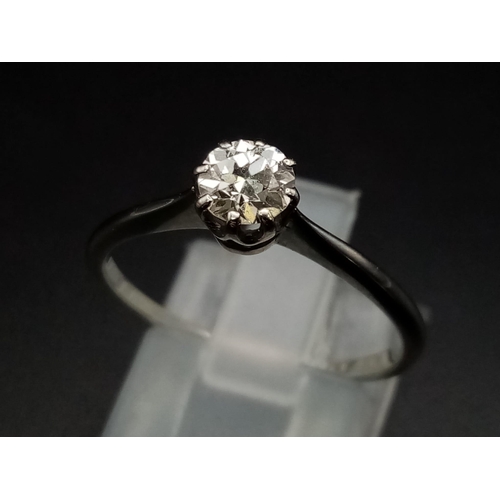 220 - A single stone solitaire ring set in 18ct white gold with a classic rex collet, circa 1980's, ring s... 