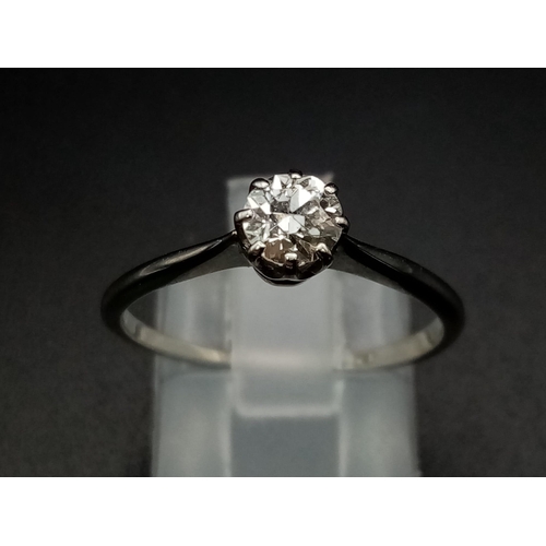 220 - A single stone solitaire ring set in 18ct white gold with a classic rex collet, circa 1980's, ring s... 