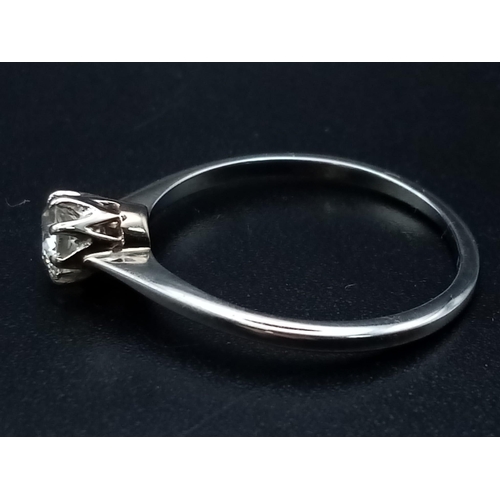 220 - A single stone solitaire ring set in 18ct white gold with a classic rex collet, circa 1980's, ring s... 