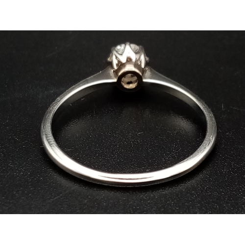 220 - A single stone solitaire ring set in 18ct white gold with a classic rex collet, circa 1980's, ring s... 