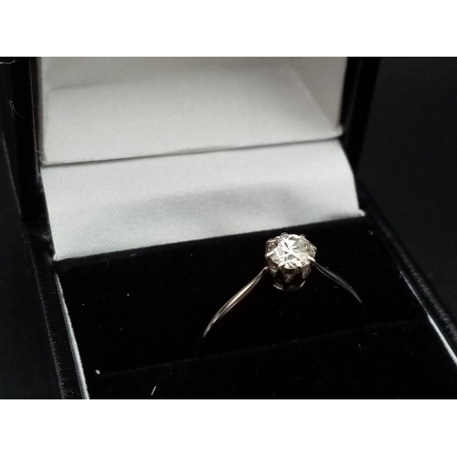 220 - A single stone solitaire ring set in 18ct white gold with a classic rex collet, circa 1980's, ring s... 