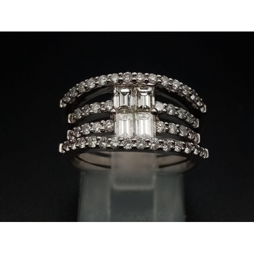 241 - This is the ultimate in a cocktail stacking ring, it is designed with natural diamond baguettes in t... 