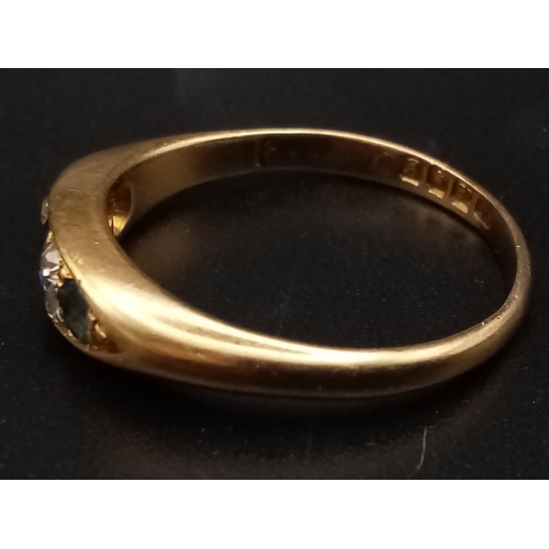 247 - An 18ct yellow gold slim band with three sapphires alternate between double set diamonds,  ring size... 