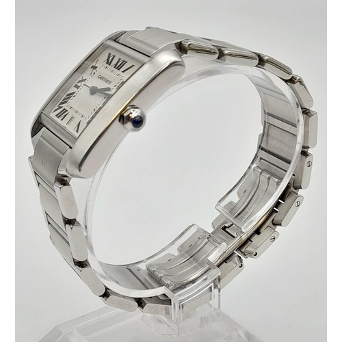 326 - THE FAMOUS CARTIER TANK WATCH ON A STAINLESS STEEL STRAP WITH ROMAN NUMERALS AND SAPPHIRE CROWN.   2... 