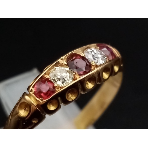 346 - An 18ct yellow gold three rubies and two diamonds ring, size M 1/2, total weight 2.40 grams